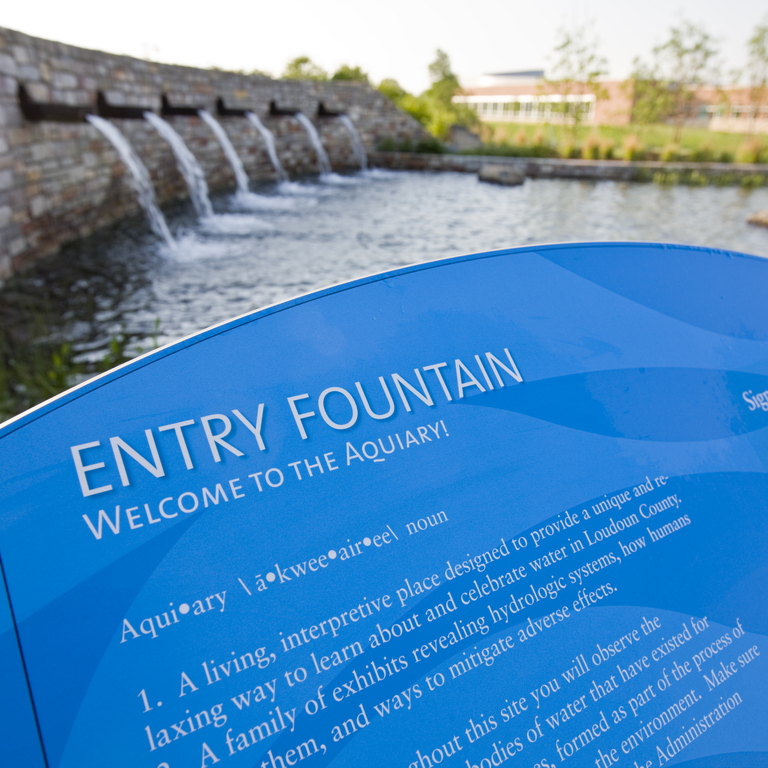 welcome to the aquiary exhibit sign