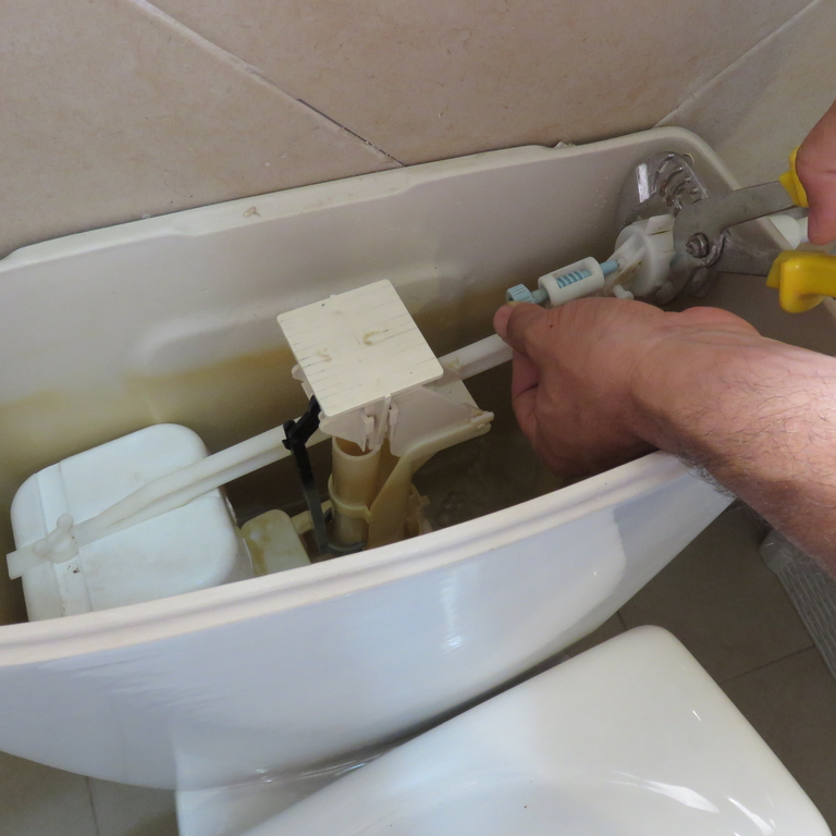 fixing a toilet