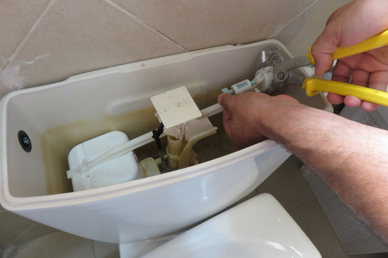 fixing a toilet
