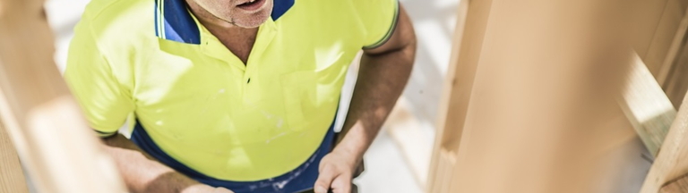 man in yellow shirt